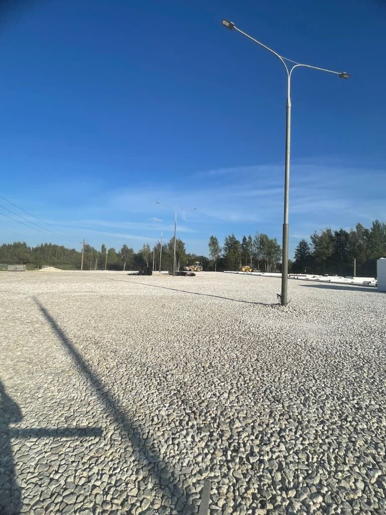 Дорожные работы в Химках — укладка асфальта на объекте